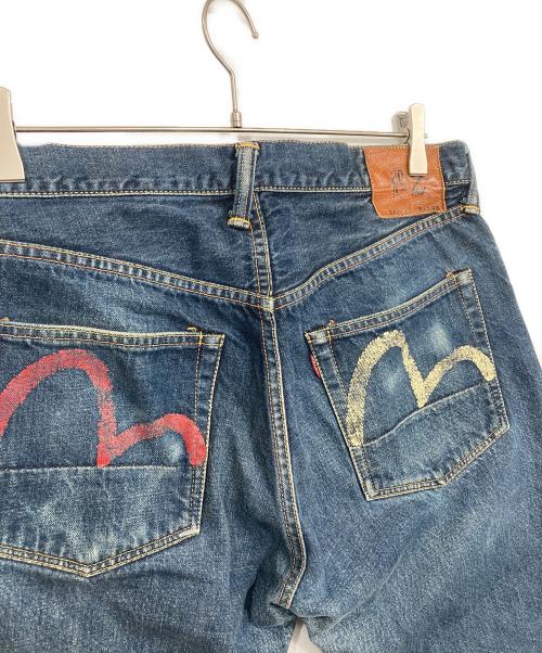 EVISU（エヴィス）EVISU (エヴィス) 白赤カモメペイントデニムパンツ インディゴ サイズ:W34×L35の古着・服飾アイテム