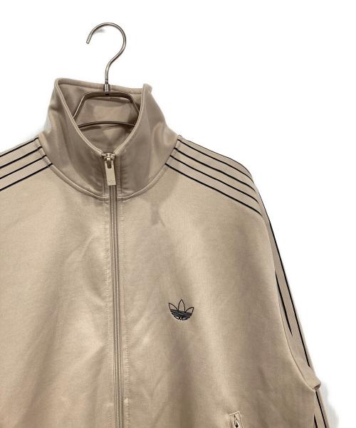 adidas（アディダス）adidas (アディダス) アウトライントレフォイル ファイヤーバード トラックトップ ベージュ サイズ:Mの古着・服飾アイテム