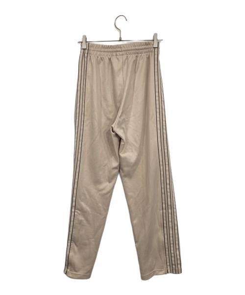 adidas（アディダス）adidas (アディダス) アウトライントレフォイル ファイヤーバード トラックパンツ ベージュ サイズ:Sの古着・服飾アイテム