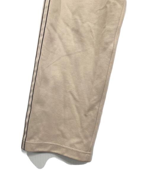 adidas（アディダス）adidas (アディダス) アウトライントレフォイル ファイヤーバード トラックパンツ ベージュ サイズ:Sの古着・服飾アイテム