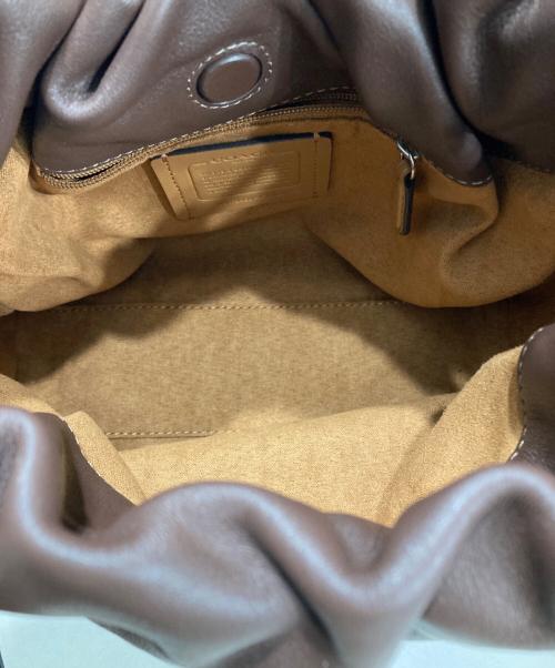 COACH（コーチ）COACH (コーチ) フェイ ドローストリング バッグ ブラウンの古着・服飾アイテム