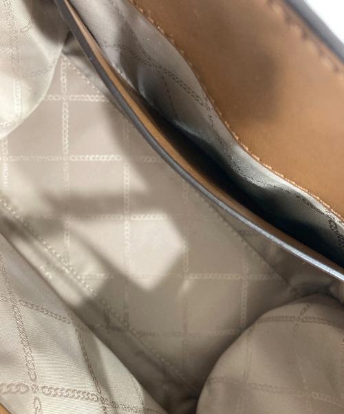 MICHAEL KORS（マイケル・コース）MICHAEL KORS (マイケル・コース) フラップ サッチェル マルチパッチワーク2WAYバッグ ブラウンの古着・服飾アイテム