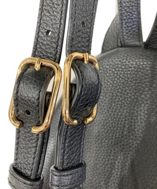 TORY BURCH（トリーバーチ）TORY BURCH (トリーバーチ) エンボスロゴシボ革ミニリュック ネイビーの古着・服飾アイテム