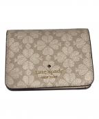 Kate Spadeケイトスペード）の古着「スペード フラワー スモール バイフォールド ウォレット」｜ベージュ