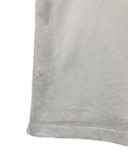 JAN COMME des GARCONS（ヤンコムデギャルソン）JAN COMME des GARCONS (ヤンコムデギャルソン) 片目刺繍ポロシャツ ホワイト サイズ:Mの古着・服飾アイテム