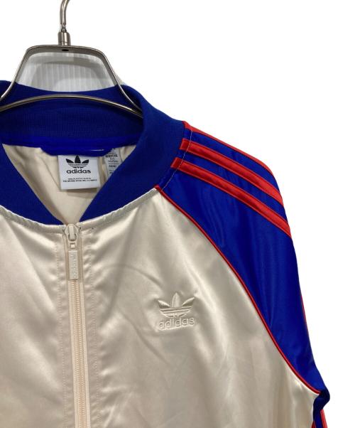 adidas（アディダス）adidas (アディダス) サテン SST トラックジャケット ベージュ×ブルー サイズ:Mの古着・服飾アイテム