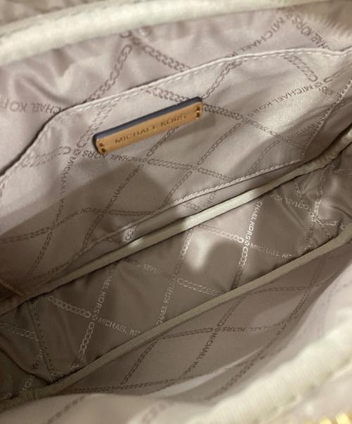 MICHAEL KORS（マイケル・コース）MICHAEL KORS (マイケル・コース) ラージイーストウエストポケットクロスボディ ベージュの古着・服飾アイテム