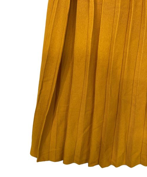 kurashi&trips publishing（クラシアンドトリップス パブリッシング）KURASHI&Trips PUBLISHING (クラシアンドトリップス パブリッシング) ワザあり編み地のニットプリーツスカート イエロー サイズ:Tの古着・服飾アイテム