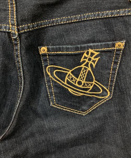 Vivienne Westwood（ヴィヴィアンウエストウッド）Vivienne Westwood (ヴィヴィアンウエストウッド) 裾ジップオーブ刺繍デニムパンツ インディゴ サイズ:2の古着・服飾アイテム