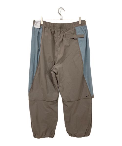 NIKE（ナイキ）NIKE (ナイキ) TECH WOVEN PRO OS PANT ブラウン×ブルー サイズ:2XL 未使用品の古着・服飾アイテム