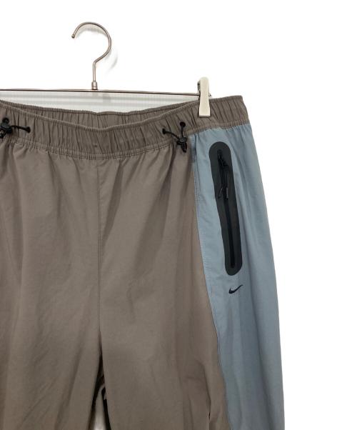 NIKE（ナイキ）NIKE (ナイキ) TECH WOVEN PRO OS PANT ブラウン×ブルー サイズ:2XL 未使用品の古着・服飾アイテム