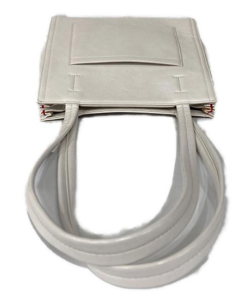 STAND OIL（スタンドオイル）Stand Oil (スタンドオイル) Oblong Bag Mini アイボリーの古着・服飾アイテム