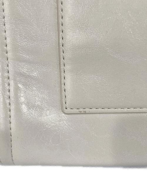 STAND OIL（スタンドオイル）Stand Oil (スタンドオイル) Oblong Bag Mini アイボリーの古着・服飾アイテム