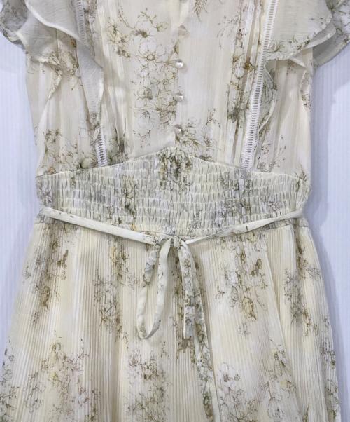 JUSGLITTY（ジャスグリッティー）JUSGLITTY (ジャスグリッティー) ブーケプリントワンピース ライトイエローの古着・服飾アイテム