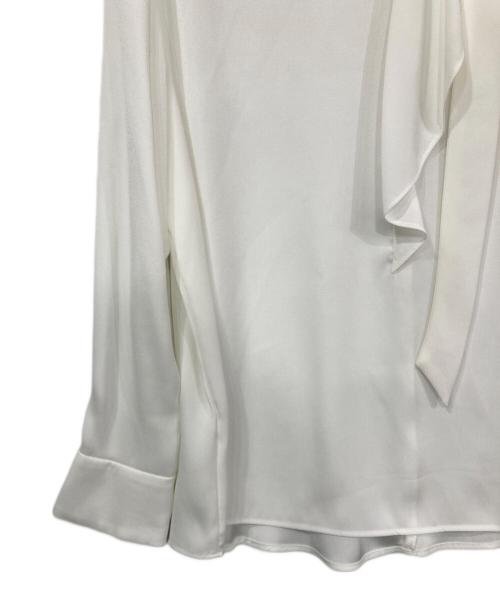 TONAL（トーナル）TONAL (トーナル) ハイネックアシメボウタイブラウス アイボリー サイズ:38の古着・服飾アイテム