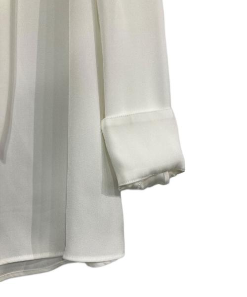 TONAL（トーナル）TONAL (トーナル) ハイネックアシメボウタイブラウス アイボリー サイズ:38の古着・服飾アイテム