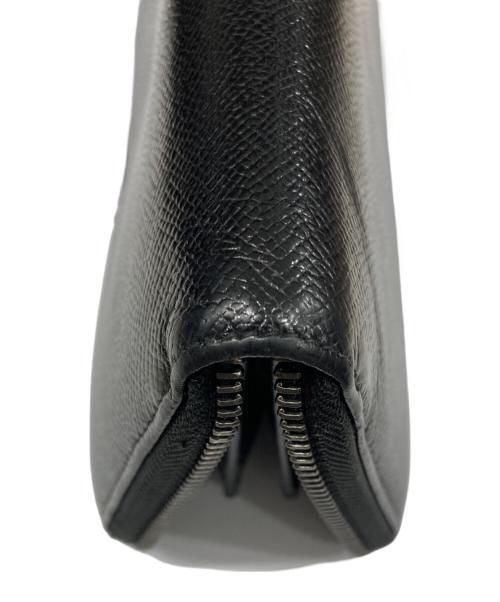 DOLCE & GABBANA（ドルチェ＆ガッバーナ）DOLCE & GABBANA (ドルチェ＆ガッバーナ) メタルプレートラウンドファスナー財布 ブラックの古着・服飾アイテム