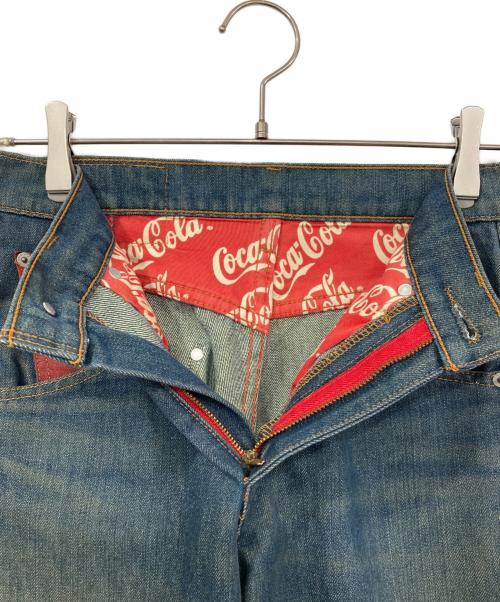LEVI'S（リーバイス）LEVI'S (リーバイス) Coca Cola (コカコーラ) 3Dデニムパンツ インディゴ サイズ:W29の古着・服飾アイテム