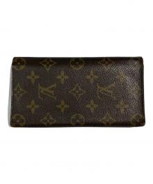 LOUIS VUITTON（ルイ ヴィトン）の古着「2つ折り財布」｜ブラウン