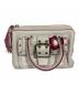 COACH（コーチ）の古着「ソーホーターンロックハンドバッグ」｜ホワイト