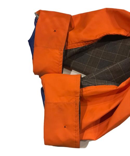 COMME des GARCONS JUNYA WATANABE MAN（コム デ ギャルソン ジュンヤ ワタナベ マン）COMME des GARCONS JUNYA WATANABE MAN (コム デ ギャルソン ジュンヤ ワタナベ マン) Buffalo man カラーブロックスモックパーカー オレンジ サイズ:Mの古着・服飾アイテム