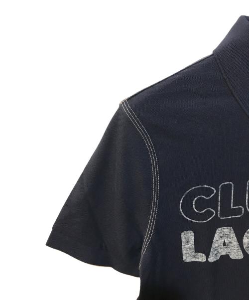 LACOSTE（ラコステ）LACOSTE (ラコステ) ヴィンテージプリント ポロシャツ ネイビー サイズ:M 未使用品の古着・服飾アイテム