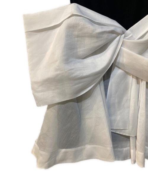 FRAY ID（フレイ アイディー）FRAY ID (フレイ アイディー) カットコンビペプラムトップス ホワイト×ブラック サイズ:Freeの古着・服飾アイテム