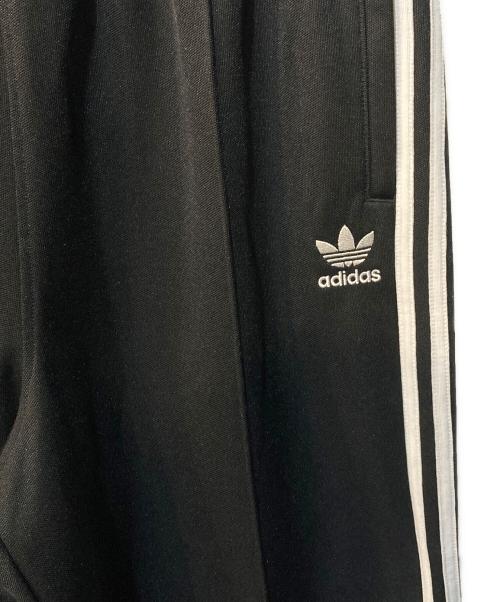 adidas Originals（アディダスオリジナル）adidas Originals (アディダスオリジナル) バギーフィット トラックパンツ ブラック サイズ:L 未使用品の古着・服飾アイテム