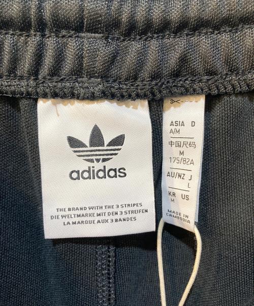 adidas Originals（アディダスオリジナル）adidas Originals (アディダスオリジナル) バギーフィット トラックパンツ ブラック サイズ:L 未使用品の古着・服飾アイテム