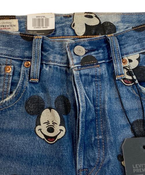 LEVI'S（リーバイス）LEVI'S (リーバイス) DISNEY (ディスニー) ミッキー総柄501デニムパンツ インディゴ サイズ:W28 未使用品の古着・服飾アイテム