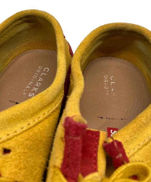 CLARKS（クラークス）CLARKS (クラークス) Supreme (シュプリーム) Wallabee Gold ワラビーゴールド オレンジ×レッド サイズ:9の古着・服飾アイテム