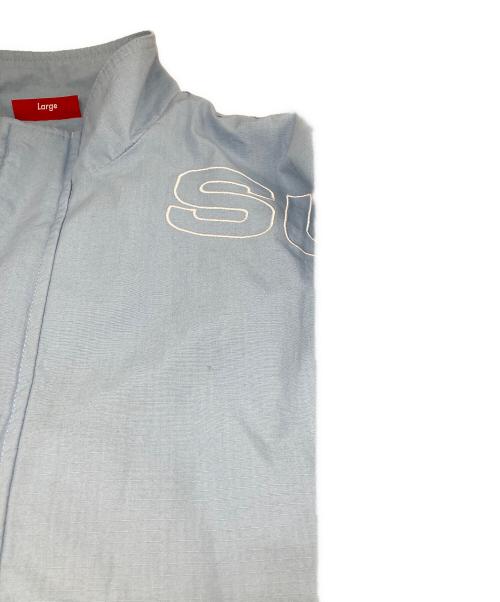 SUPREME（シュプリーム）SUPREME (シュプリーム) SPellout Embroidered Ripstop Track Jacket スカイブルー サイズ:Lの古着・服飾アイテム