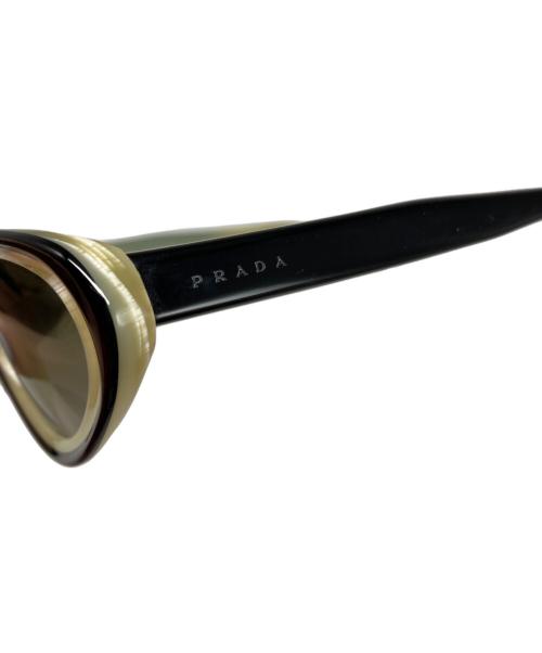PRADA（プラダ）PRADA (プラダ) キャットアイサングラス ベージュの古着・服飾アイテム