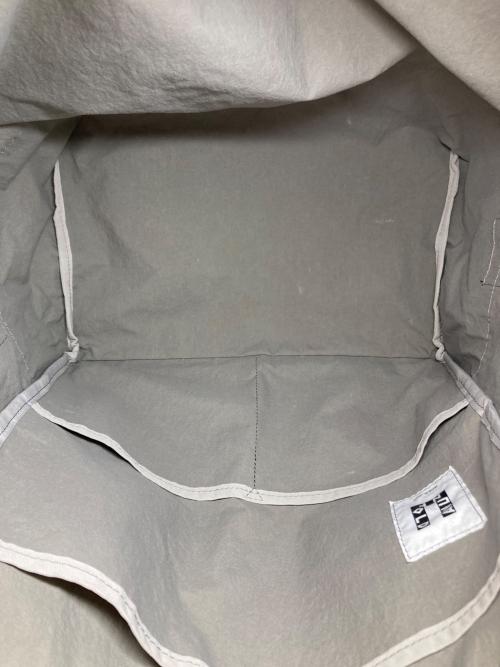 ANUNFOLD（アヌンフォルド）ANUNFOLD (アヌンフォルド) SIDE POCKET TOTE グレーの古着・服飾アイテム