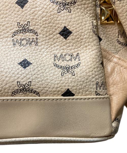MCM（エムシーエム）MCM (エムシーエム) スタッズバクパック ベージュの古着・服飾アイテム