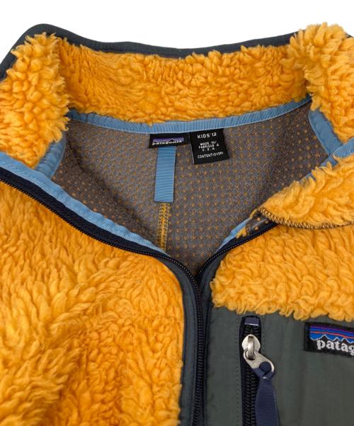 Patagonia（パタゴニア）Patagonia (パタゴニア) クラシックレトロカーディガン オレンジ サイズ:kids12(S程度)の古着・服飾アイテム