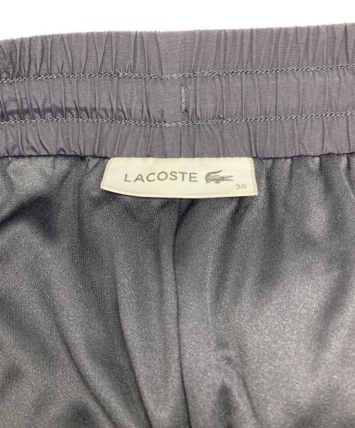 LACOSTE（ラコステ）LACOSTE (ラコステ) ライトウェイトワイドストレートパンツ ネイビー サイズ:38の古着・服飾アイテム