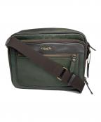 COACHコーチ）の古着「Essex Leather Flight Case」｜グリーン