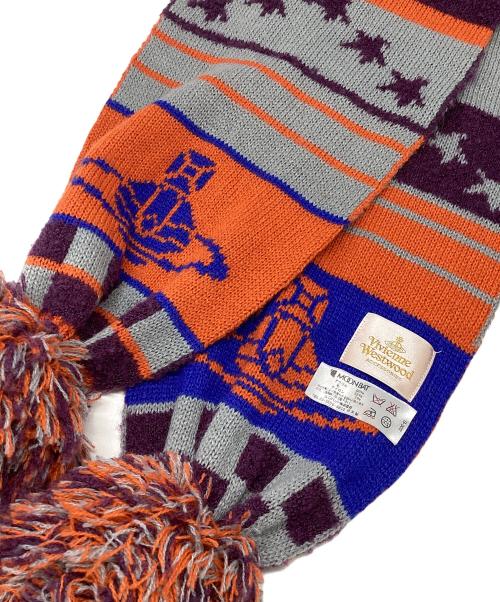 Vivienne Westwood（ヴィヴィアンウエストウッド）Vivienne Westwood (ヴィヴィアンウエストウッド) ボンボンマフラー オレンジの古着・服飾アイテム