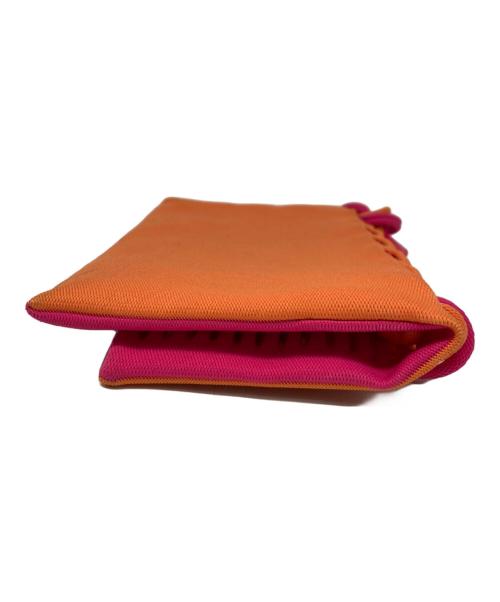 GOOD GOODS ISSEY MIYAKE（グッドグッズ イッセイミヤケ）GOOD GOODS ISSEY MIYAKE (グッドグッズ イッセイミヤケ) MOKKO FLAP POUCH オレンジの古着・服飾アイテム