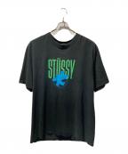 stussyステューシー）の古着「サーフマンTシャツ」｜ブラック