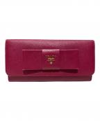 PRADAプラダ）の古着「リボンZIP長財布」｜ピンク