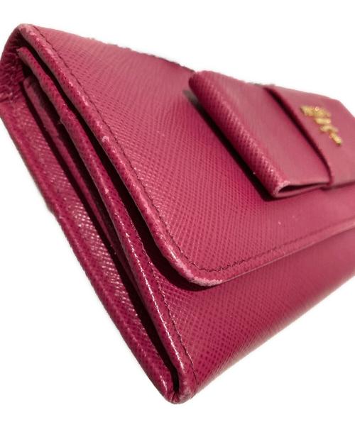 PRADA（プラダ）PRADA (プラダ) リボンZIP長財布 ピンクの古着・服飾アイテム