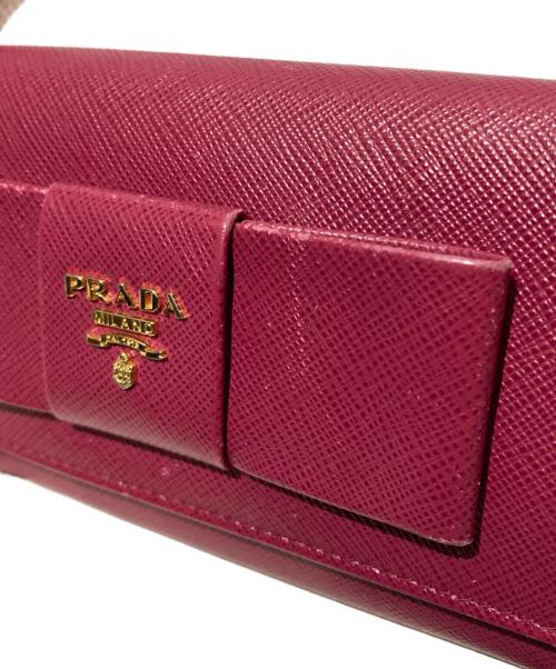 PRADA（プラダ）PRADA (プラダ) リボンZIP長財布 ピンクの古着・服飾アイテム