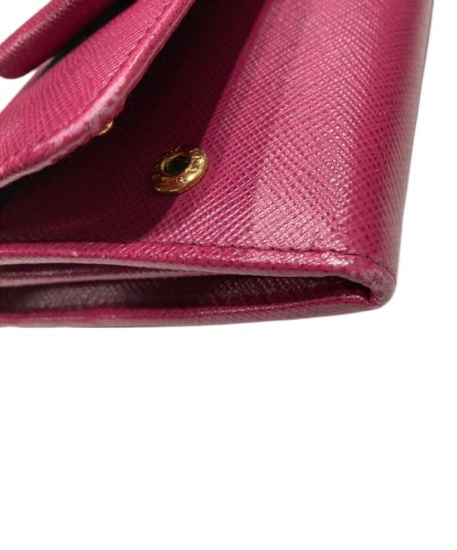 PRADA（プラダ）PRADA (プラダ) リボンZIP長財布 ピンクの古着・服飾アイテム