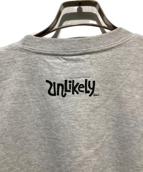 Unlikely（アンライクリー）Unlikely (アンライクリー) NEPENTHES (ネペンテス) LOGO POCKET T-SHIRT グレー サイズ:Mの古着・服飾アイテム