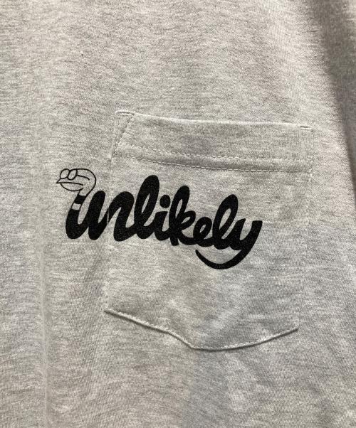 Unlikely（アンライクリー）Unlikely (アンライクリー) NEPENTHES (ネペンテス) ICON POCKET T-SHIRT グレー サイズ:Sの古着・服飾アイテム