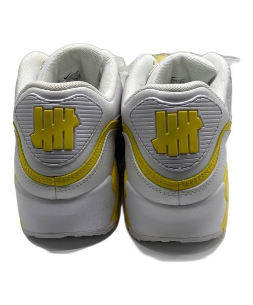 NIKE（ナイキ）NIKE (ナイキ) Undefeated (アンディフィーテッド) Nike Air Max 90 White Optic Yellow サイズ:28.5㎝の古着・服飾アイテム