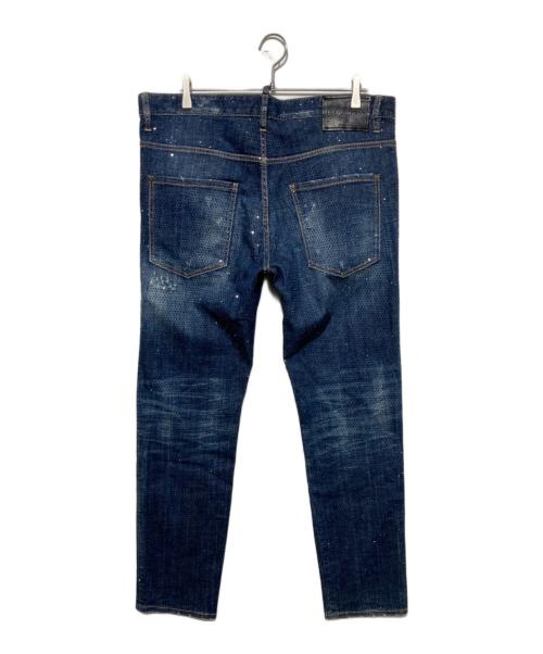 DSQUARED2（ディースクエアード）DSQUARED2 (ディースクエアード) クラッシュ加工ラインストーン付きスリムデニムパンツ インディゴ サイズ:54の古着・服飾アイテム