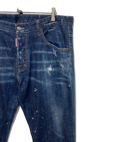 DSQUARED2（ディースクエアード）DSQUARED2 (ディースクエアード) クラッシュ加工ラインストーン付きスリムデニムパンツ インディゴ サイズ:54の古着・服飾アイテム
